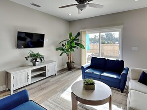 Studio (3 Bedrooms) | Living area | 40-inch flat-screen TV with cable channels, TV - Beach Bliss by Resort Collection (Panama City Beach)