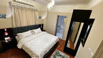 2 soveværelser, pengeskab på værelset, strygejern/strygebræt