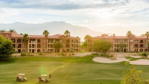 A hotel with multiple buildings, a golf course, and palm trees. - Marriott's Shadow Ridge 1- The Villages 1 Bedroom- perfect for Coachella. (Palm Desert)