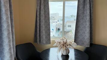 Panoramic Room, 1 King Bed with Sofa bed, Fireplace, Ocean View | Living area | 50-inch Smart TV with digital channels, fireplace, iPod dock