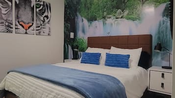 4 habitaciones, escritorio, tabla de planchar con plancha y wifi gratis