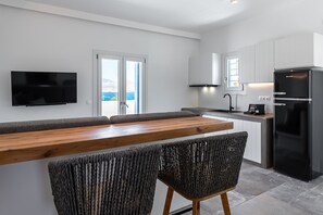 Premium Suite, 1 Bedroom, Hot Tub | In-room dining - Manesis Suites (Milos)