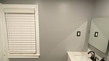 Hair dryer, towels, soap, toilet paper