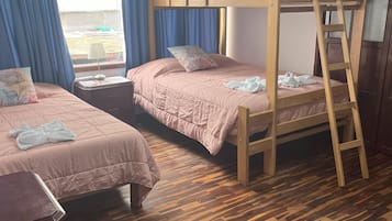 Family Quadruple Room | 1 bedroom, down comforters, individually furnished, desk
