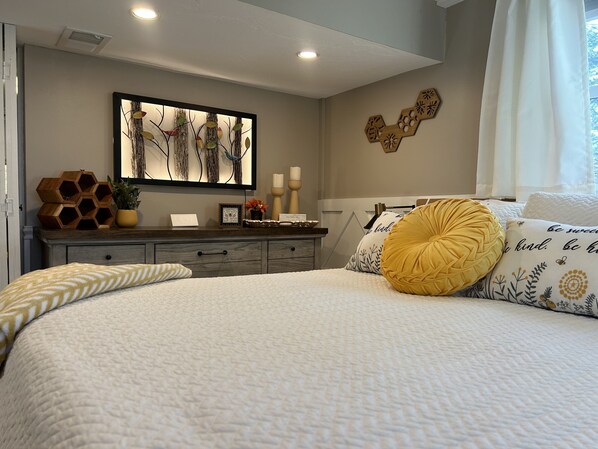 1 bedroom, desk, iron/ironing board, travel crib