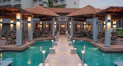 Condo at front of the beach inside a Resort compound hotel.