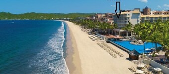 Condo at front of the beach inside a Resort compound hotel.