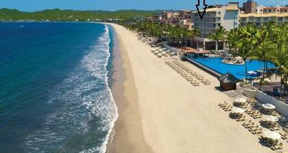 Condo at front of the beach inside a Resort compound hotel.
