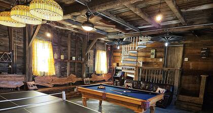 Large rustic home with gameroom. Near lakes, skiing, walk to downtown.