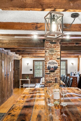 Large rustic home with gameroom. Near lakes, skiing, walk to downtown.