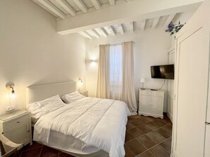 1 quarto, Wi-Fi de cortesia, roupa de cama