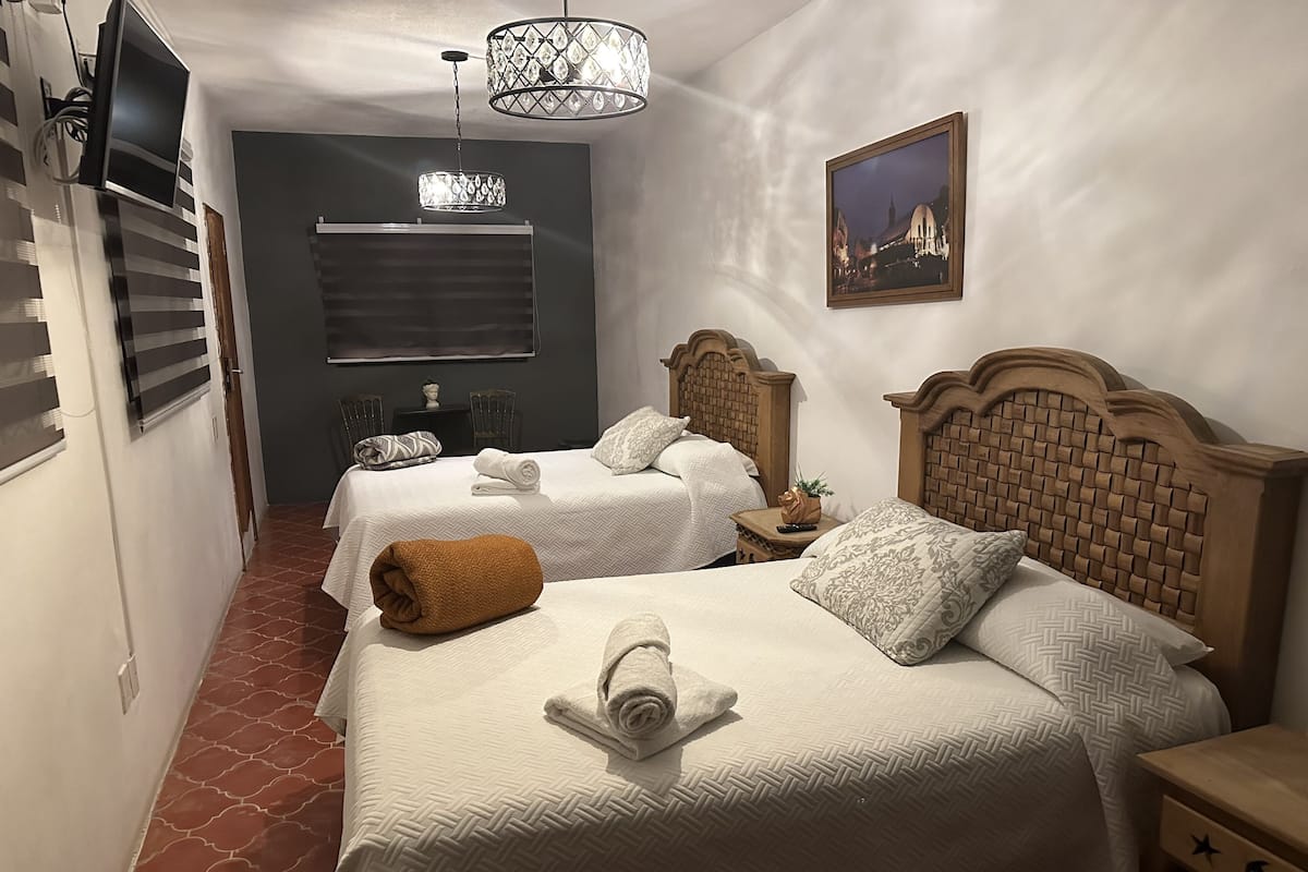 Classic Quadruple Room, 2 Queen Beds, Ensuite, City View | Pillowtop beds, WiFi (free), individually decorated