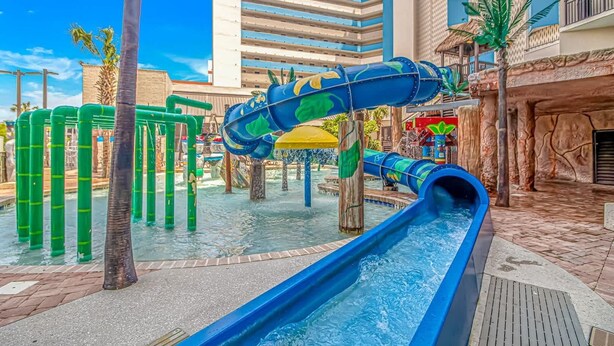 A water park with slides and climbing structures. - Ocean Reef 526 (Myrtle Beach)