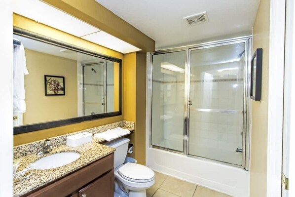 Hair dryer, towels, soap, shampoo
