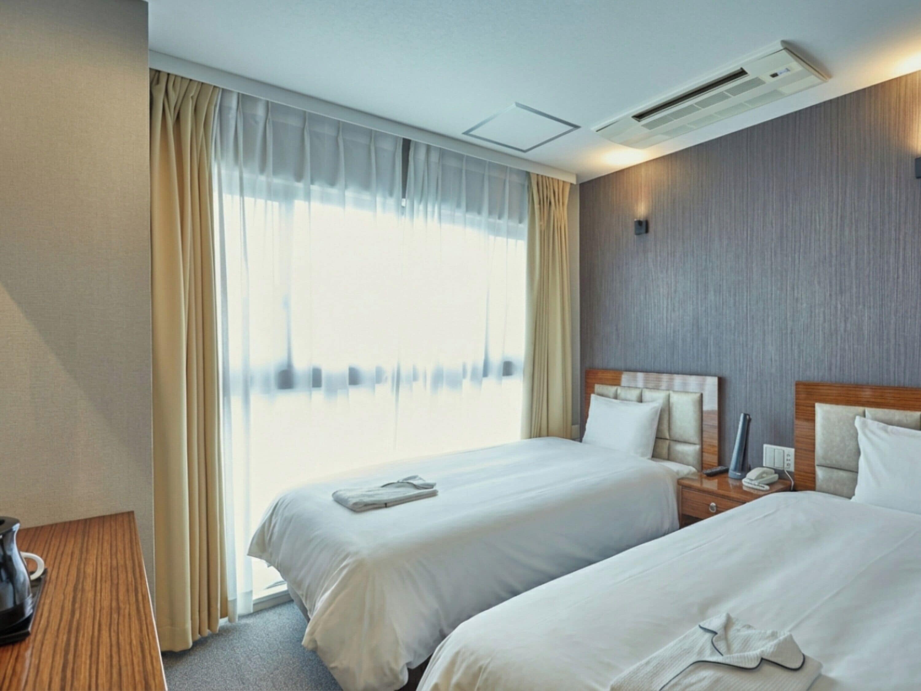 Twin Room | Bed sheets