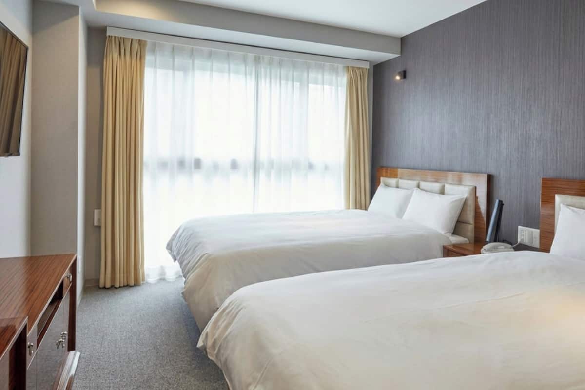 Deluxe Twin Room | Bed sheets