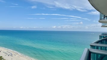 On the beach, sun loungers, beach towels
