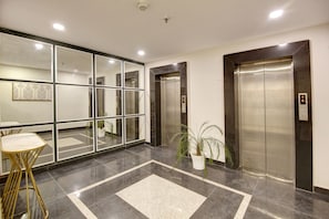 Elevator - Saltstayz Premier - Golf Course Extension Road (Gurugram)