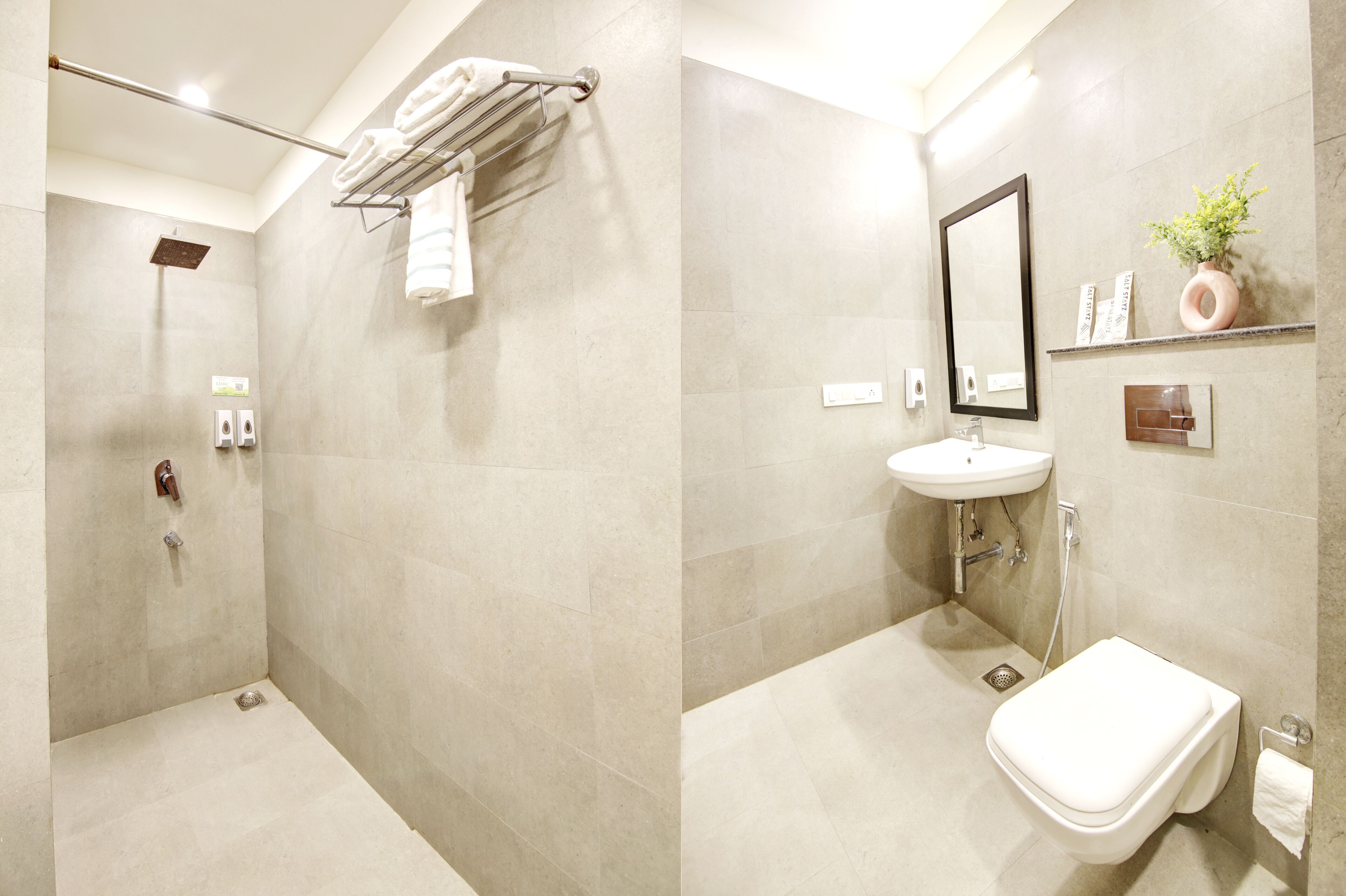 Ein modernes Badezimmer mit Dusche, Toilette und Waschbecken.