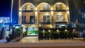 A building named "Salt Stayz" with a modern design, featuring balconies and large windows. - Saltstayz Select- Medicity Near Medanta Hospital (Gurugram)