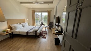Superior Room With Balcony | Premium bedding, desk, soundproofing, free WiFi - Saltstayz Express – Medicity (Near Medanta Hospital) (Gurugram)