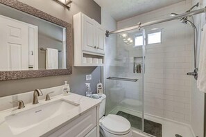 Shower, hair dryer, shampoo