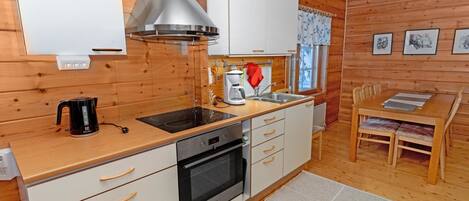 Fridge, microwave, dishwasher, cookware/dishes/utensils