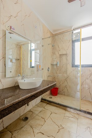 Shower, free toiletries, hair dryer, slippers