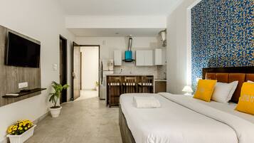 Premium bedding, Tempur-Pedic beds, desk, laptop workspace