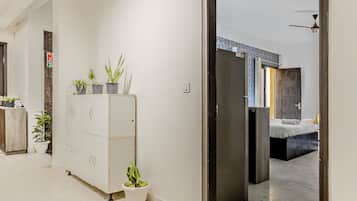 Premium Studio Suite | Living area | 42-inch flat-screen TV with satellite channels