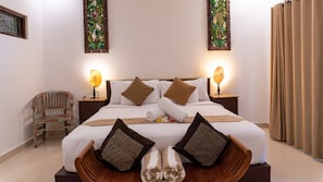 2 quartos, ferros/tábuas de passar roupa, roupa de cama