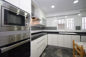Fridge, microwave, oven, coffee/tea maker