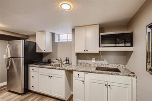 Fridge, microwave, stovetop, coffee/tea maker