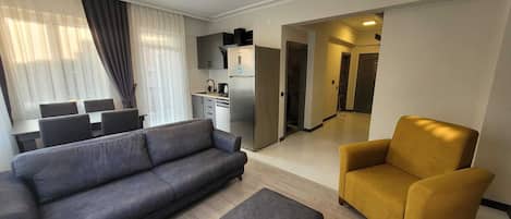 Basic Apartment | Living area | 1-inch LCD TV with satellite channels