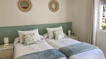 3 slaapkamers, een strijkplank/strijkijzer, gratis wifi, beddengoed