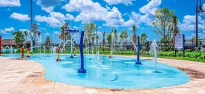A water park with multiple water features and a clear blue sky. - 3073 PP - Storey Lake (Kissimmee)