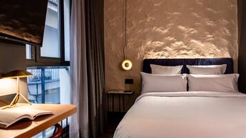 Economy Double Room | 1 bedroom, premium bedding, down comforters, in-room safe