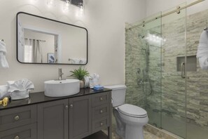 Shower, hair dryer, towels