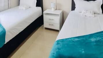Casa | 3 habitaciones, tabla de planchar con plancha y wifi gratis