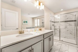 Shower, hair dryer, towels