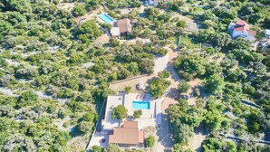 An aerial view of a residential area with houses, a swimming pool, and surrounding greenery. - Resort Amalka Mare by Litto (Trogir)