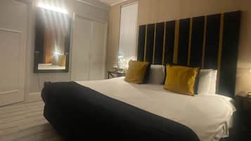 Departamento | 1 habitación, tabla de planchar con plancha, wifi gratis y ropa de cama