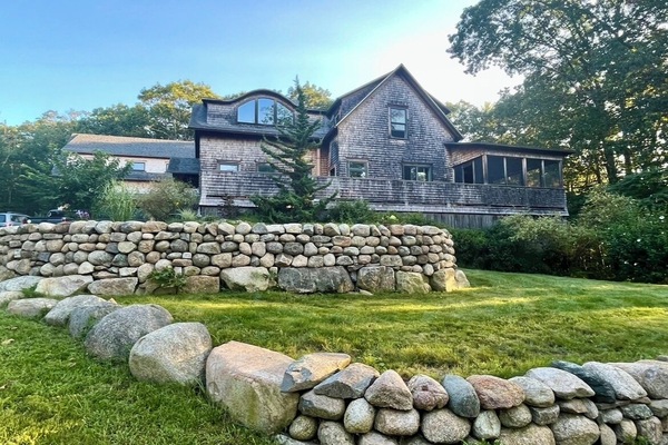 Front of house, large, terraced lawns for children to play.