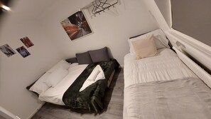Apartemen | 2 kamar tidur, setrika/meja setrika, Wi-Fi gratis, dan seprai linen