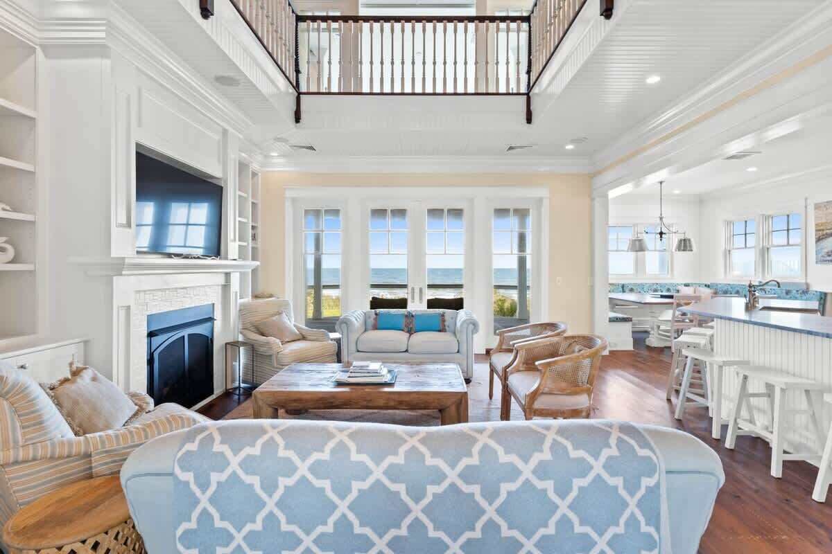 Televisio, takka, stereot, työhuone