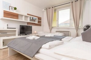 1 bedroom, desk, iron/ironing board, travel cot