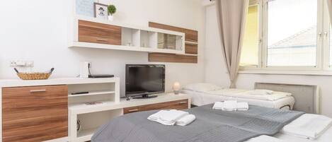 1 bedroom, desk, iron/ironing board, travel cot