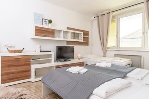 1 bedroom, desk, iron/ironing board, travel cot