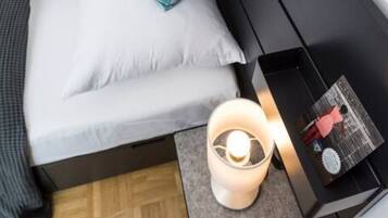 1 bedroom, desk, iron/ironing board, travel crib