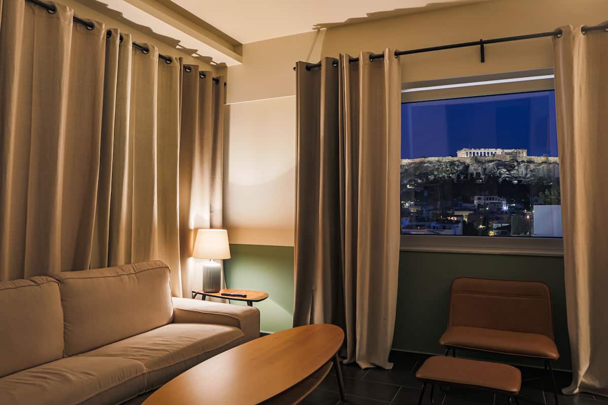 Junior Suite, 1 King Bed, Non Smoking (502) | 1 bedroom, down comforters, in-room safe, desk